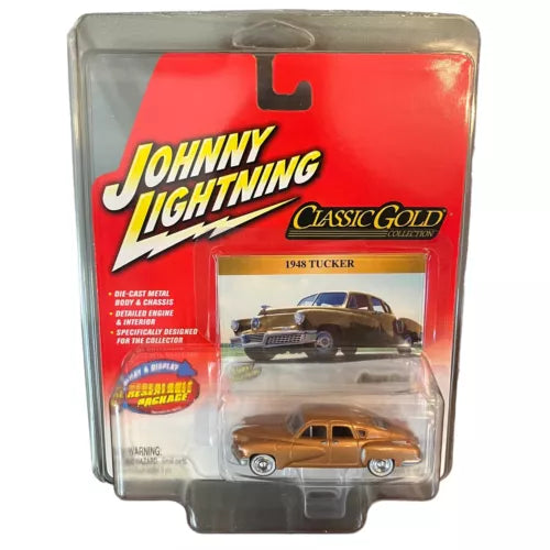 Diecast 1948 Tucker model car in clear box, brown-orange finish