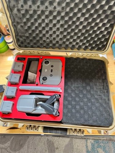 DJI Air 2 drone with controller and spare parts in hard case