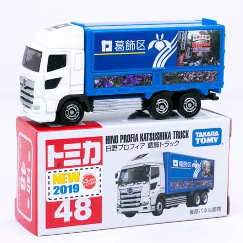 Diecast box truck model, white cab with blue cargo body, on display box