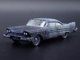 Speckled blue-gray diecast model car, classic 1958 sedan with hood details
