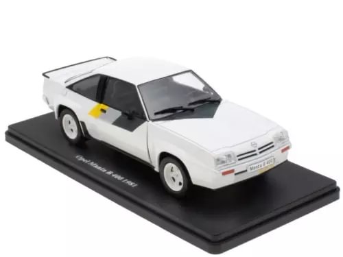 White die-cast model car with open driver door and front windshield