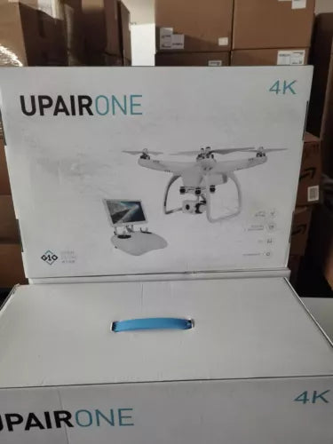 Upair One 4K quadcopter drone retail box with accessories in open packaging