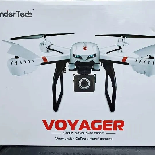 Voyager 6-axis drone with mounted action camera, white body with black and red details