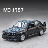 Black 1:36 BMW M3 1987 diecast car model with detailed front grille and wheels