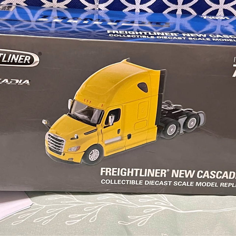 Yellow Freightliner New Cascadia sleeper cab truck tractor diecast model, front and side view