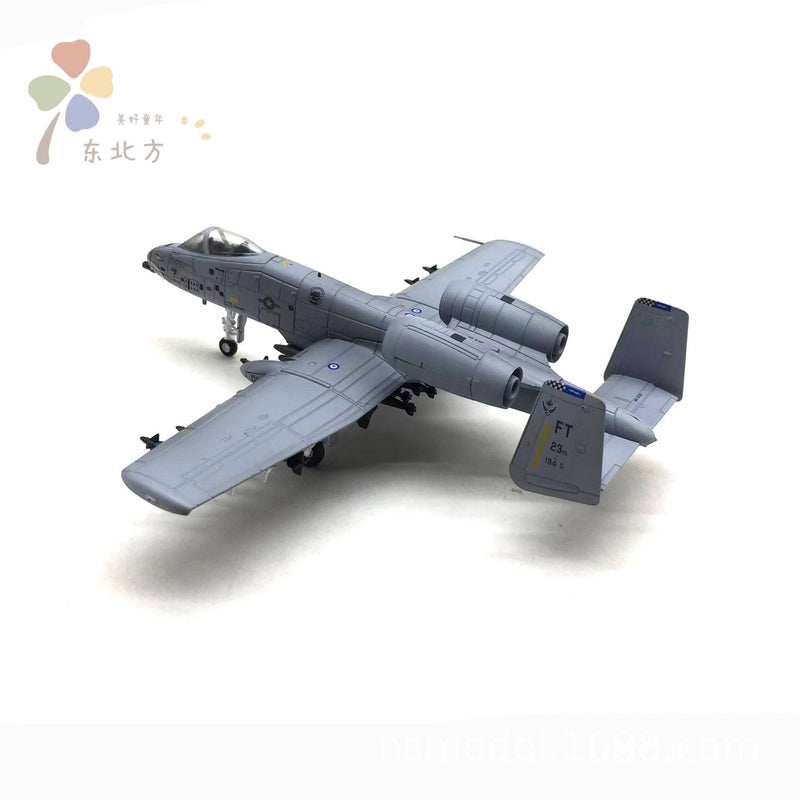 Gray alloy RC jet aircraft model with landing gear and wing details