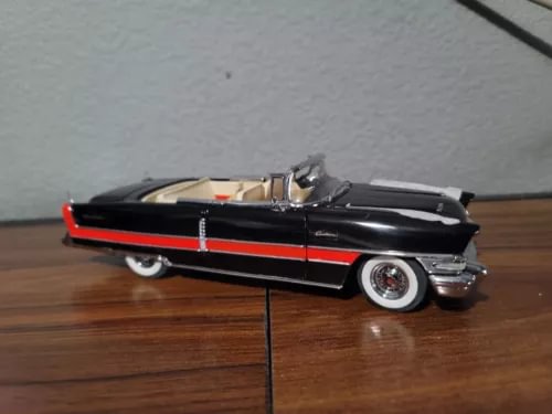 Danbury Mint 1956 Packard convertible diecast car, black with red stripe, 1:24 scale