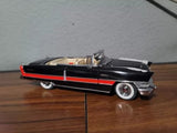 Danbury Mint 1956 Packard convertible diecast car, black with red stripe, 1:24 scale