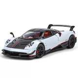 Alloy diecast sports car model with black rear wing, white body, red accents.