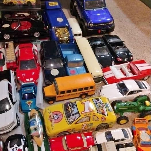 Assorted diecast cars lot, various colors and styles, close-up collection