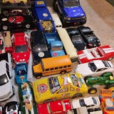 Assorted diecast cars lot, various colors and styles, close-up collection
