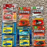 Set of Matchbox diecast cars in blister packs, red and blue cards, 'Moving Parts'