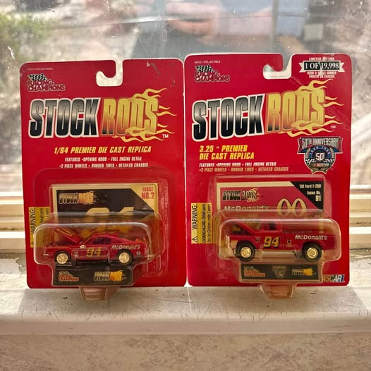 Diecast Stock Rods car collectibles in red blister packaging, two car models shown