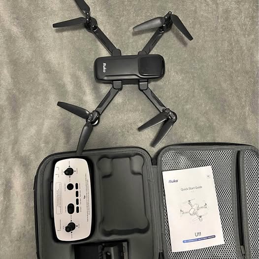 Ruko drone with camera, controller in carrying case and instruction sheet