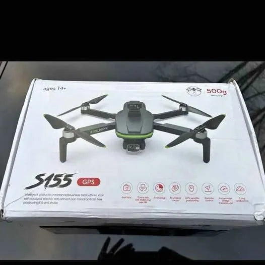 GPS quadcopter drone on box, gray and green with four propellers