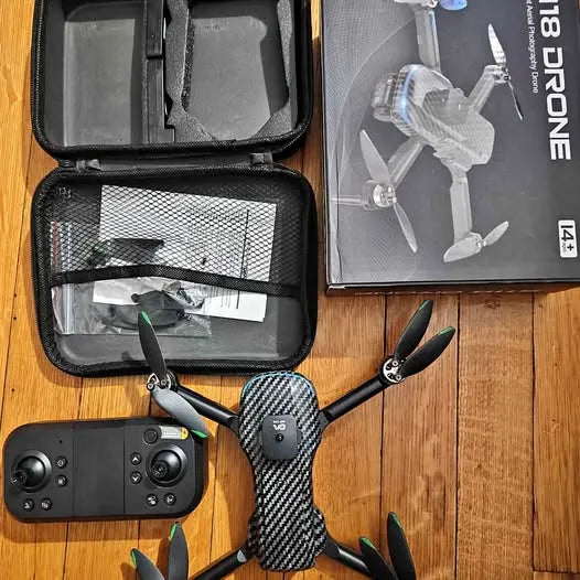 Beginner drone with controller and carrying case, gray patterned body and propellers