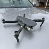 DJI Mavic Pro drone with 4 rotors, front camera and landing legs