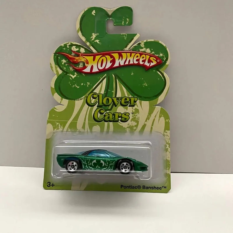 Green Pontiac Banshee diecast car in Hot Wheels Clover Cars blister package