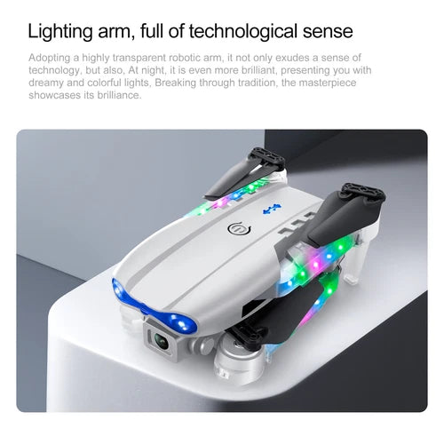 White foldable quadcopter drone with multi-color LED lights and camera module