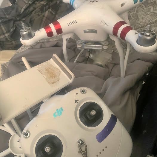 DJI Phantom 3 Standard drone with front camera, white body and red arm accents