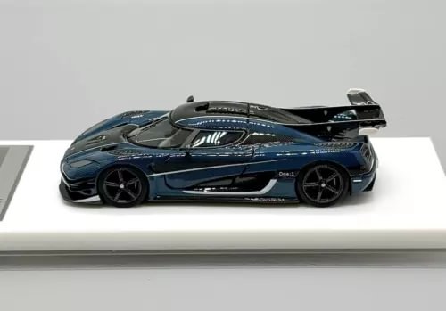 Blue and black racing sports diecast car model, 1:64 scale, front 3/4 view