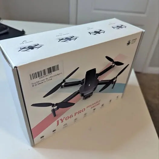Drone camera packaging box with quadcopter illustration