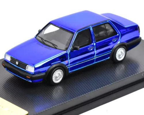 Plating blue diecast sedan model car with front three-quarter view and black windows
