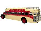 Beige and red diecast coach bus model with TRAILWAYS lettering and front grille