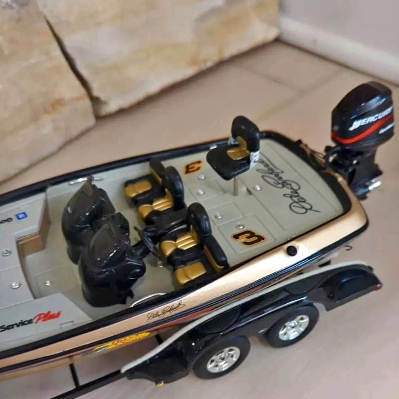 1/24 diecast bass boat with light deck, yellow seats, and Mercury-style outboard