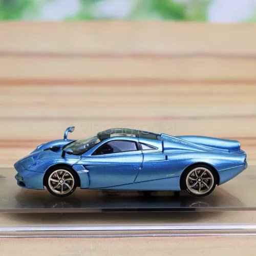 Blue 1/64 die-cast Pagani Huayra Codalunga model sports car, side view