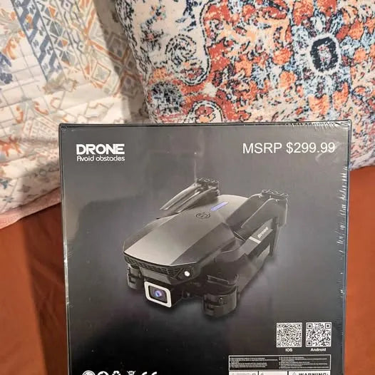 Drone retail box with illustrated quadcopter and MSRP $299.99 text