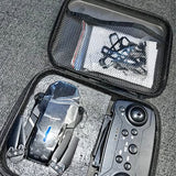 Foldable drone with built-in camera in black hard case