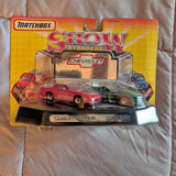 Diecast car blister pack with two sports cars, red and blue