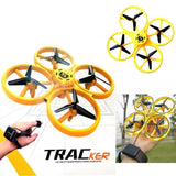 Orange LED quadcopter drone with four blades and yellow circular guards, plus remote controller
