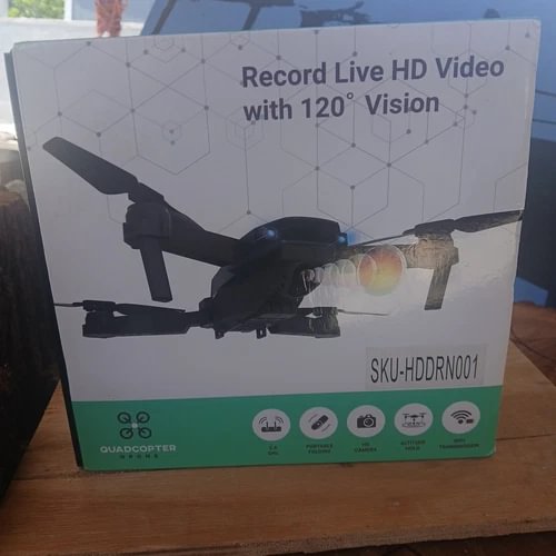 Quadcopter drone with HD camera retail box, showing drone image and '120° Vision'.