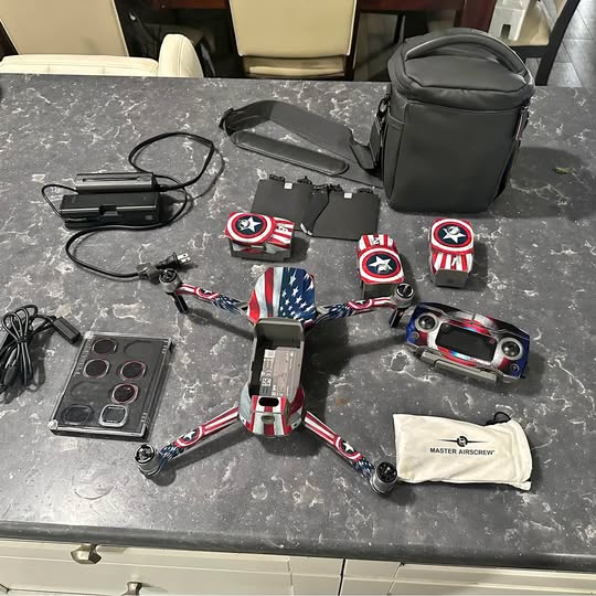 DJI Mavic 2 Pro drone accessories kit with controller, batteries, and carrying bag