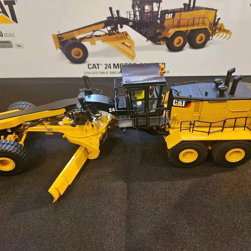 1:50 diecast Caterpillar 24 motor grader model, yellow with front blade