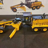 Diecast Masters 1:50 Caterpillar 24 Motor Grader Mastic NY