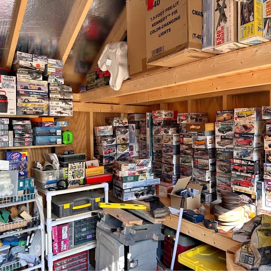 Diecast car model kits assortment on store shelf in boxes and blister packs