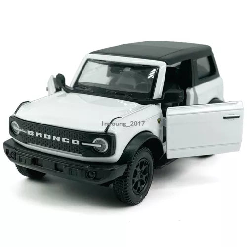 White diecast metal toy Ford Bronco pickup, 1:36 scale, front 3/4 view