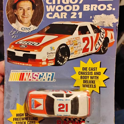 Orange, white and black Citgo #21 NASCAR diecast car model with deluxe wheels