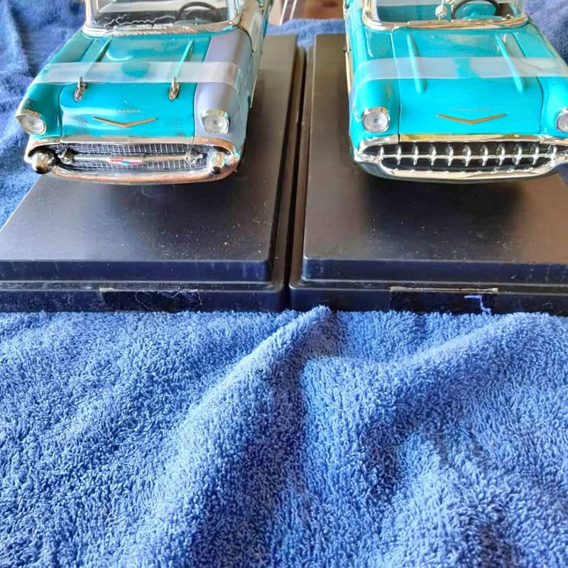 Turquoise 1957 Chevrolet convertible diecast car front view, chrome grille and bumper