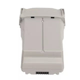 Rechargeable drone battery pack with exposed contacts on bottom, light gray casing