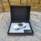 1/43 GAC concept car diecast model in open display box, white coupe with detailed wheels