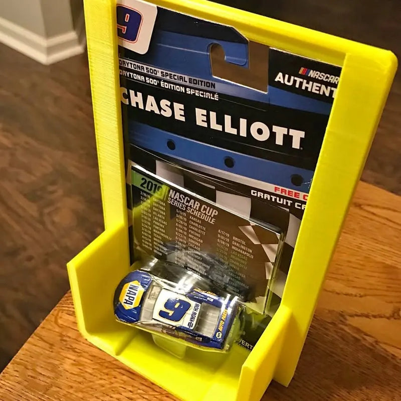 Diecast car protector sleeve with No. 9 car model in yellow retail box