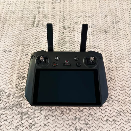 DJI RC Pro remote controller with dual antennas and built-in touchscreen display