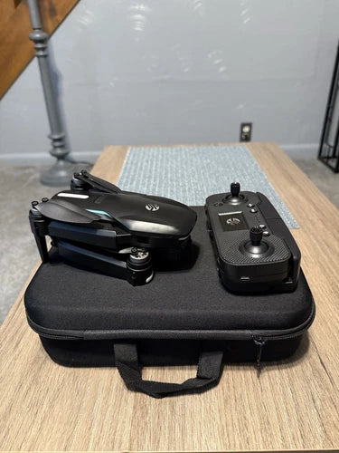 Camera drone and remote controller in zippered hard carrying case