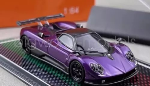 Purple racing sports diecast model car with black wheels and rear vents.
