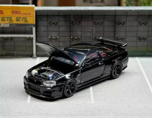 Black diecast sports car model with open hood, front-left view