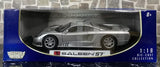 Silver 1:18 die-cast Saleen S7 sports car model with detailed wheels
